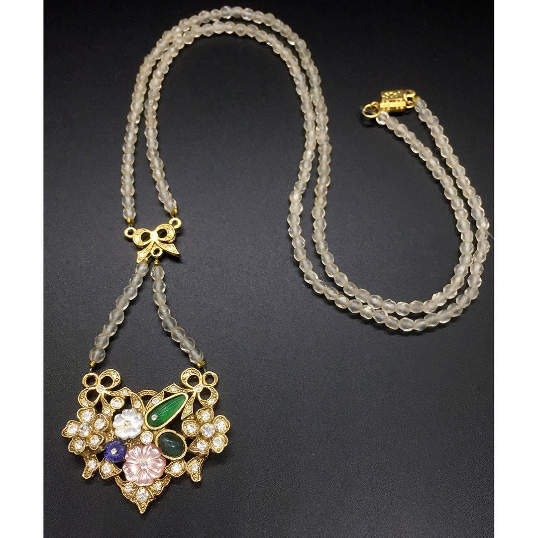 Beautiful Faceted Crystal with molded Floral Stones rhinestone Pendant