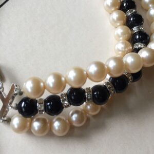 Trifari-faux-pearl-rondell-and-black-bead-triple-strand-necklace-4.jpg