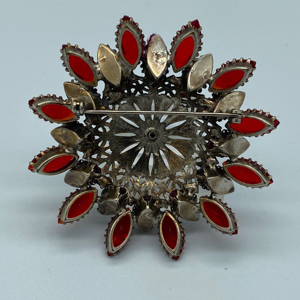 large-red-rhinestone-brooch-e1625354129231.jpg