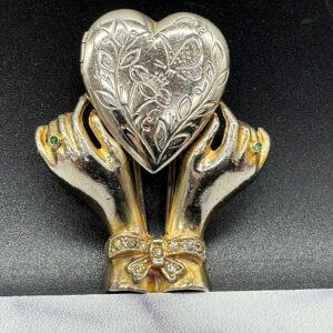 vintage-hand-and-heart-fur-clip.jpg